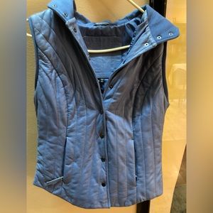 Periwinkle leather hooded vest.